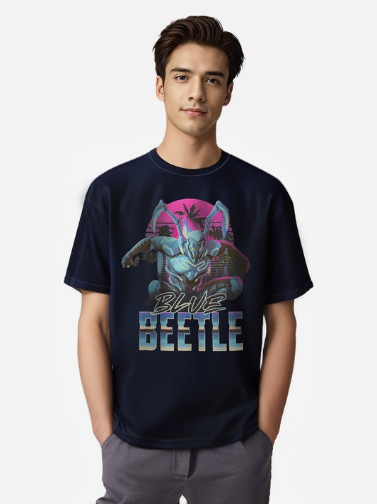 Model wearing DC Blue Beetle City Jump graphic T-shirt, navy color