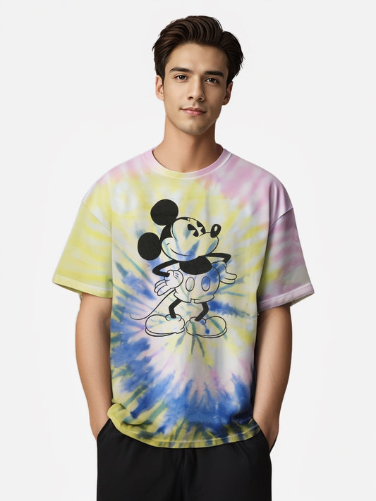 Model wearing Disney Mickey tie-dye graphic T-shirt with hands in pockets