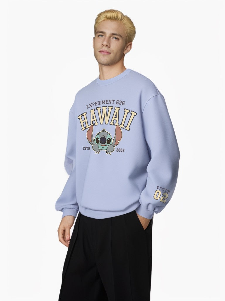 Side view of male model wearing Disney Stitch Hawaii graphic sweatshirt in light blue.