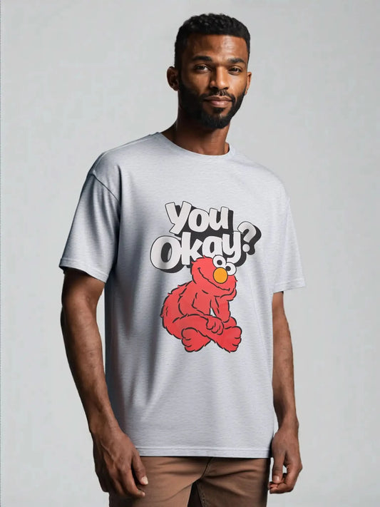 Man wearing Elmo “You Okay?” graphic tee in heather gray – licensed Sesame Street™ unisex t-shirt with funny slogan.