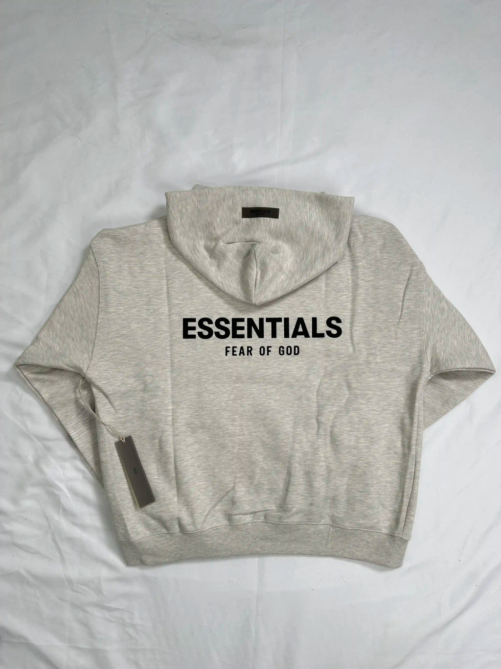 ESSENTIALS 2022 fleece hoodie in Light Oatmeal, back view with large ESSENTIALS logo
