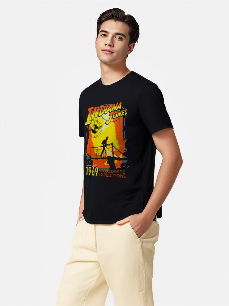 Young man wearing Indiana Jones black graphic tee with expedition print – side view