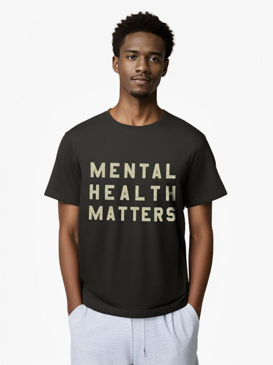 Model wearing Mental Health Matters graphic T-shirt, front view.