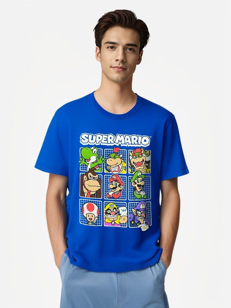 Front view of model wearing Super Mario™ blue graphic tee featuring Nintendo characters grid print.